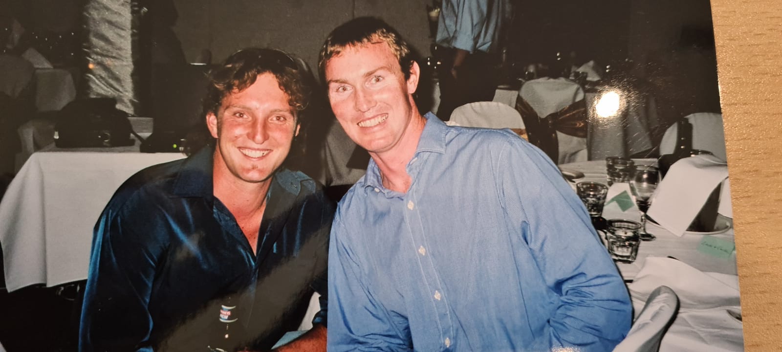 Zac Simpson in the early 2000 with an old colleague at a dinner